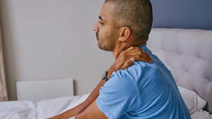 Person Rubbing Shoulder